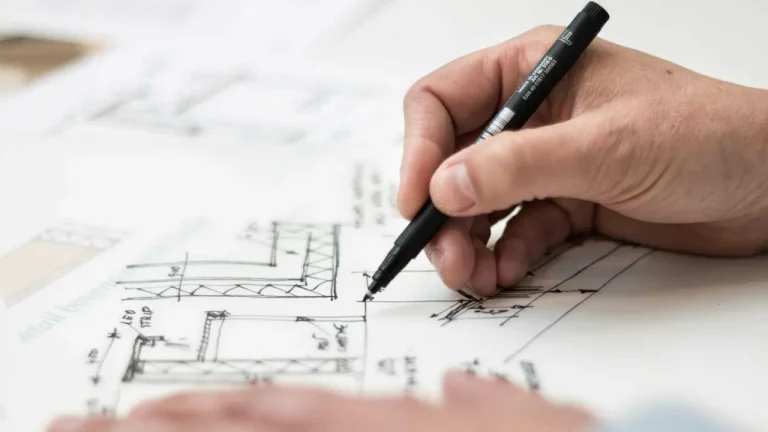 Moderná mestská štvrť s inteligentnými budovami a zelenou infraštruktúrou, prezentujúca inovatívne projektové riešenia.
